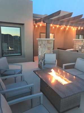 Front Patio & Firepit - Enjoy a stunning sunset or sunrise from the front patio while sitting around our cozy outdoor firepit.