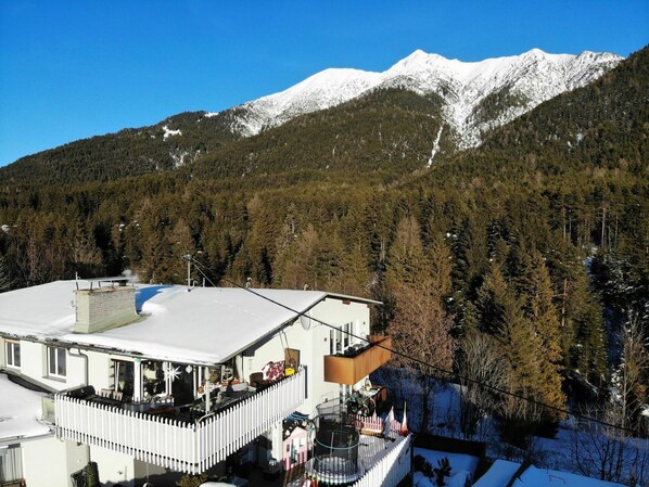 Sky, Property, Mountain, Snow, Building, Slope, Mountain Range, Landscape, Tree, Leisure