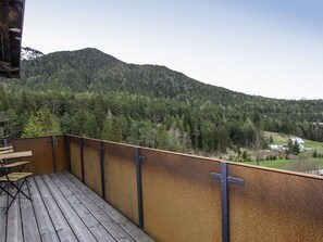 Sky, Furniture, Plant, Fence, Tree, Wood, Mountain, Outdoor Furniture, Landscape, Roof