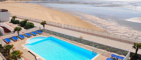 Dive into the gorgeous outdoor pool on a hot summer day.