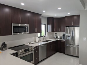 African ribbon wood cabinets