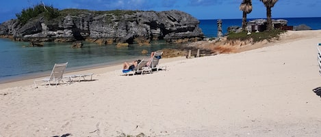 Tobacco Bay relaxing  the beachfront apts front yard 