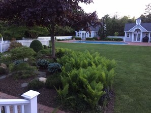 view behind the house facing the pool (gym and poolhouse)