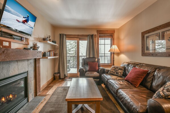 living room with balcony access