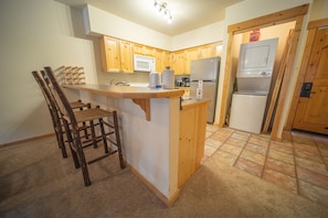 Bar stool seating and Washer/Dryer