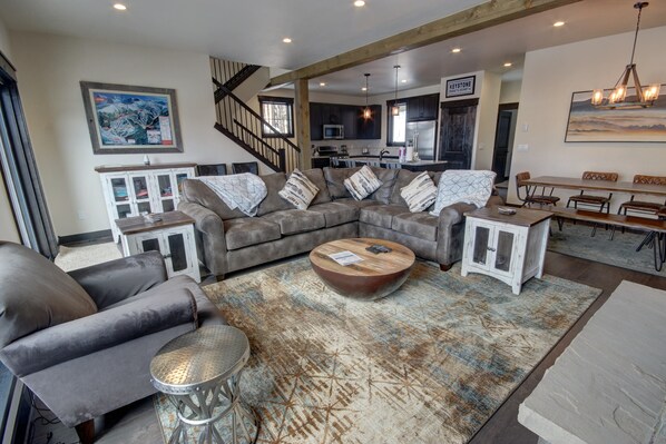 Living room with a two section couch and coffee table