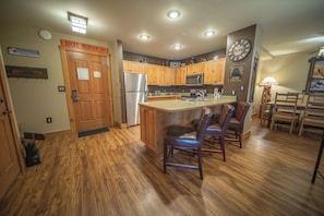 Barstool seating to keep the cook company