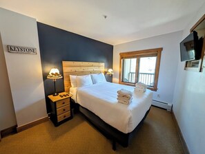 Spacious bedroom with comfortable furnishings