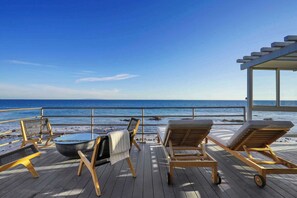 Imagine mornings with coffee in hand, overlooking endless ocean waves.