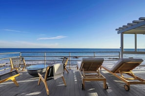 Imagine mornings with coffee in hand, overlooking endless ocean waves.