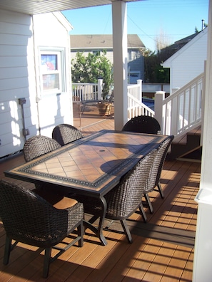 Outdoor dining area as well under the overhang for those rainy days.