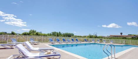 Take in gorgeous views while lounging around the on-site outdoor pool.