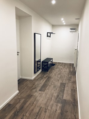 Hall with entrance door and bedro