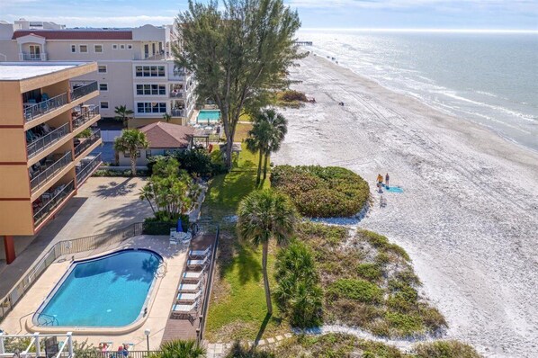 View of the beachfront pool and complex from the sky. Plenty of - View of the beachfront pool and complex from the sky. Plenty of beach space to spread out and enjoy.