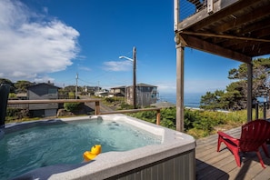 The ocean view hot tub is the perfect spot to sit and relax.