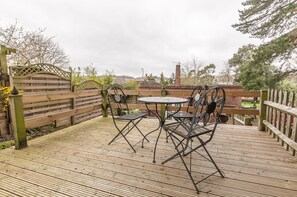 Balcony up in the garden with the city view