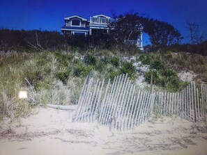 view from beach looking back at house