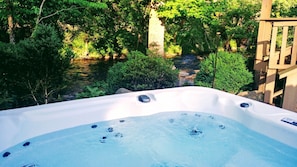 Relax in the Hot Tub while listening to the birds chirp or the creek sing...