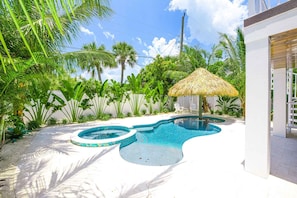 Pool & Spa with Large Tiki, Table, and Stools