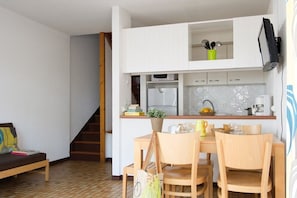 Reconnect with loved ones over a meal at the dining table.