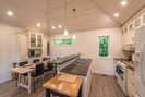 Open kitchen and dining with raised island seating