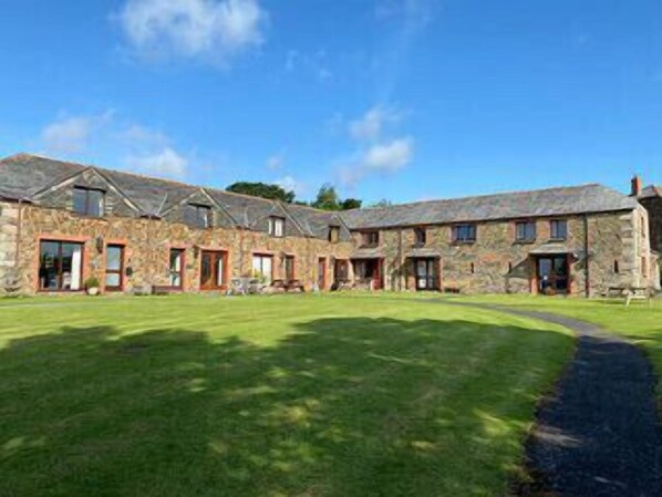 Fabulous space to at the front to relax or play. Private garden to rear.