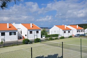 Tennis court and our villa