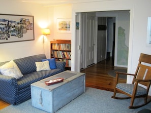 Sitting room: comfy seating and plenty of books.