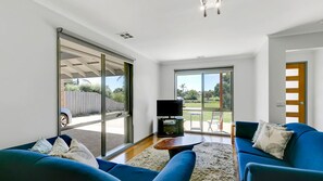 Main Living room, featuring Smart TV and comfortable seating