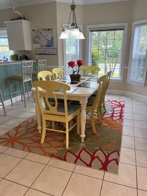 Bright, cherry dining and living areas