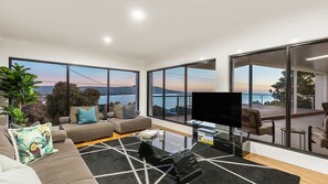 Ellerina Main Living Room features abundant natural light and stylish finishes