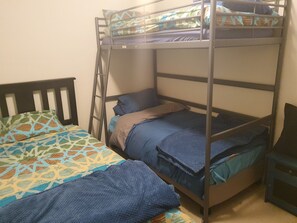 Bedroom 3 - bunk bed, king single bed, cubic shelves, toys, games, books
