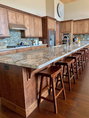 Butterflied granite slab - comfortably seats six stools with room to spare.