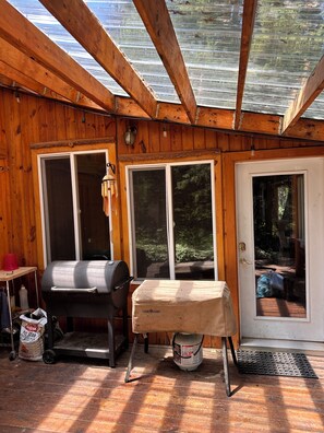 Covered deck to grill.