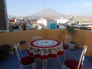 outdoor dining room with view of volcano Misti