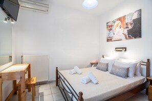 Your private room with a double bed air conditioning, and washing machine.