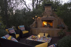 Front patio's outdoor gas fireplace.
