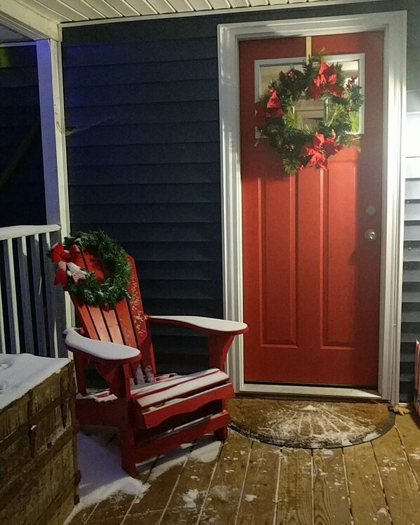 Porch overlooking a large back yard