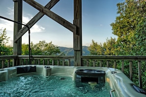 Hot Tub - Covered hot tub with amazing mountain view.
