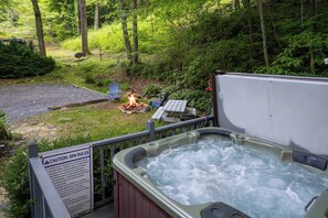 Hot tub - Settle into the bubbling embrace of your private hot tub.