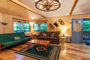 Welcome to your cabin! - Main level - Living room, porch door.