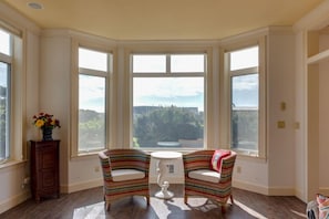 Enjoy the sunshine and a favorite drink while sitting at the living room bay window.