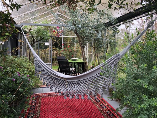 De orangerie verbonden met de luxe cabin