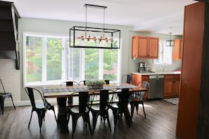 Dining area with plenty of seating and modern lighting