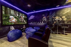 This private home theater and arcade will immediately transport you to a faraway galaxy! So settle into one of the comfortable theater seats, and enjoy a movie night on our giant 110-inch projection screen and state-of-the-art sound system.