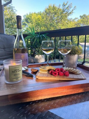 Grab Your Favorite Drink and Relax on the Back Covered Porch.