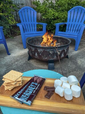 Cozy Up to the Outdoor Wood Burning Fire Pit.