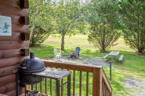 Outdoor Area - Outdoor area with charcoal grill, picnic table, and fire pit.