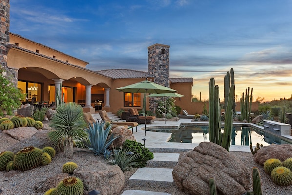 Take in sunsets from the huge patio or while lounging on the shallow sun deck of the pool.