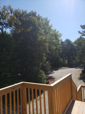 View from the deck of the driveway where you will pull in.
